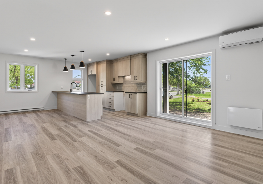 Aire ouverte cuisine et salon d’un logement neuf à louer à Salaberry-de-Valleyfield